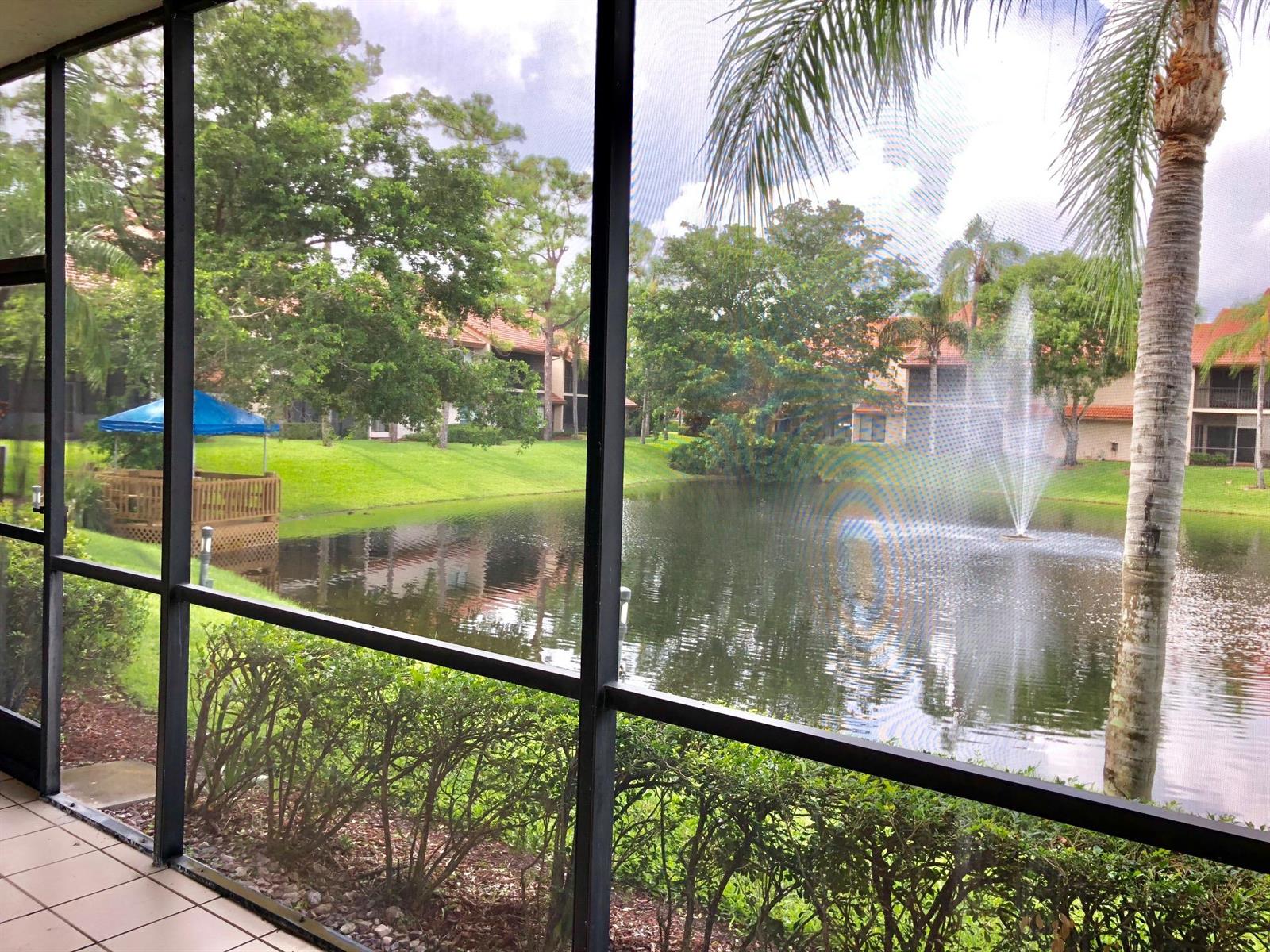 5801 Coach House Circle, Unit D Boca Raton, FL 33486 - Photo 31 of 34 Lake view