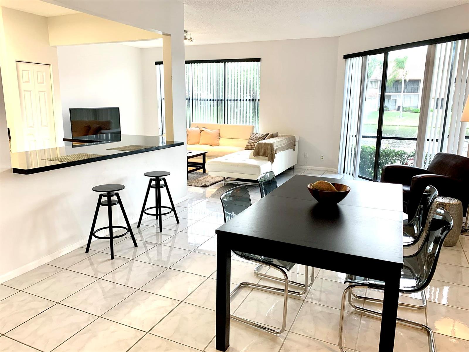 5801 Coach House Circle, Unit D Boca Raton, FL 33486 - Photo 6 of 34 Dinning room
