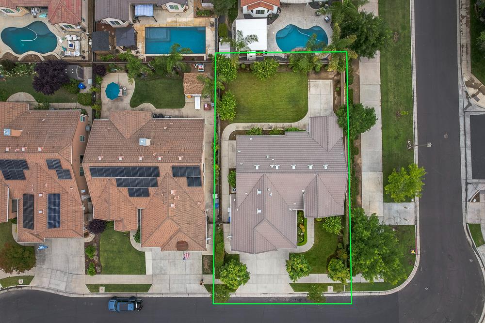 3235 Rall Avenue Clovis, CA 93619 - Photo 33 of 33 an aerial view of multiple houses with yard