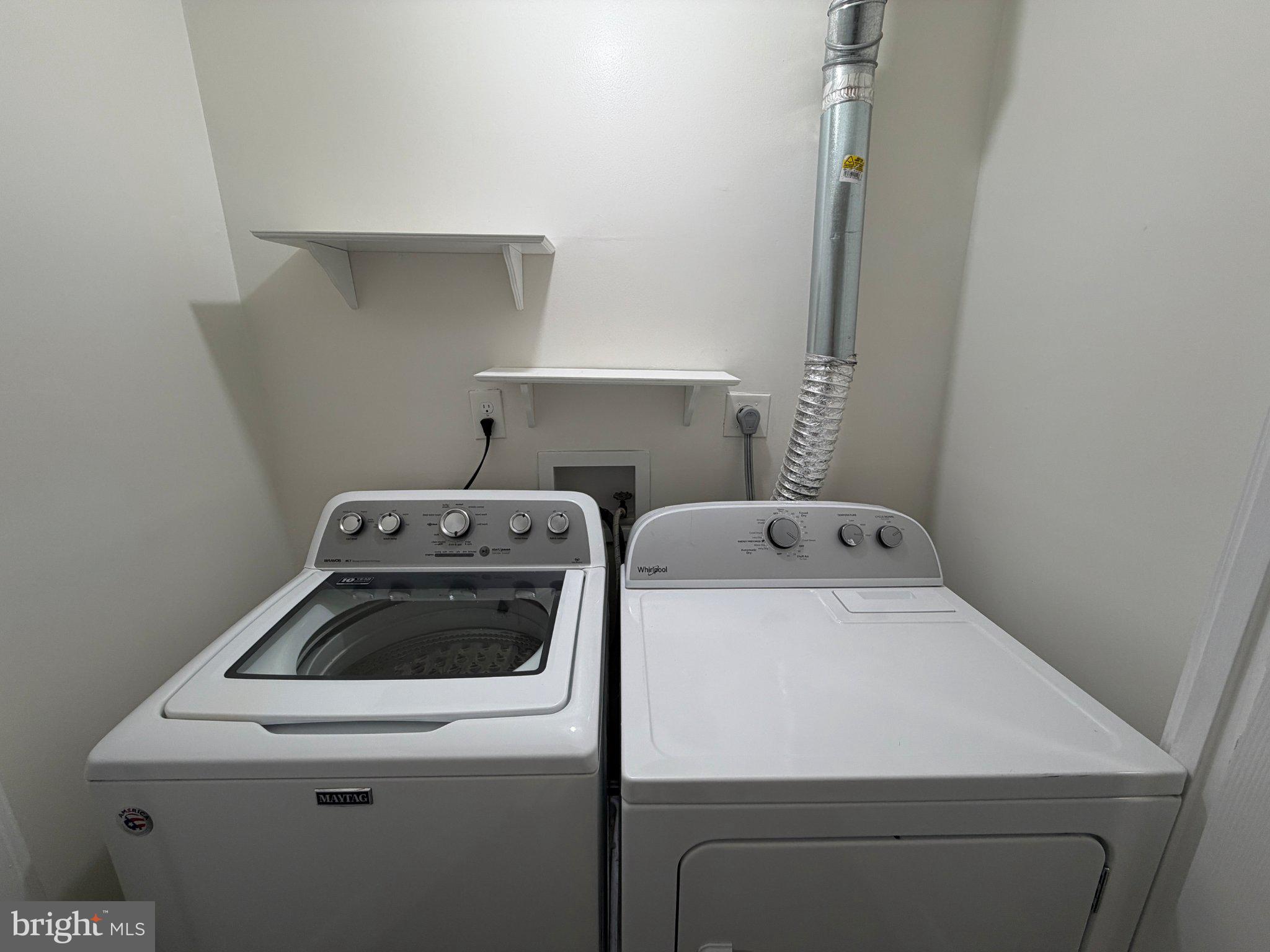 2121 Whisper Way Reston, VA 20191 - Photo 37 of 61 Modern laundry setup in bright space.