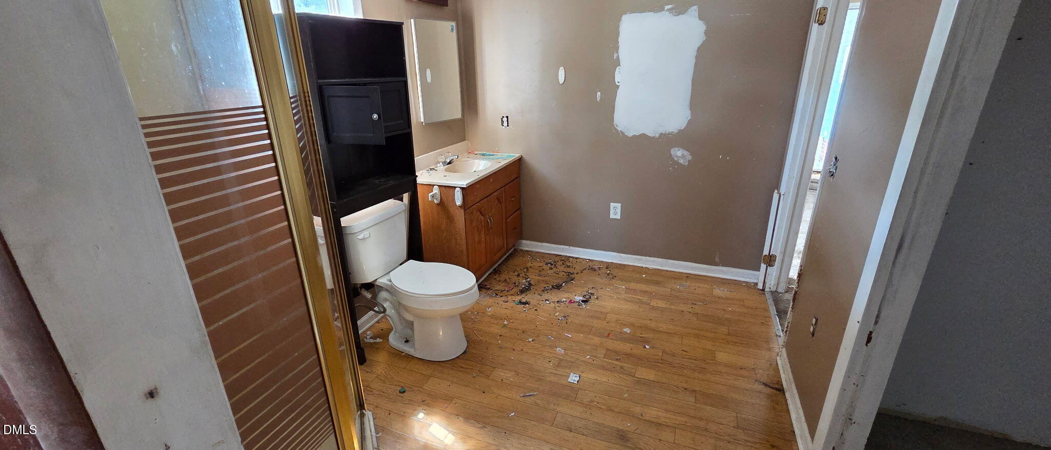 484 Yellow Skin Road Autryville, NC 28318 - Photo 7 of 24 a bathroom with a toilet and a mirror
