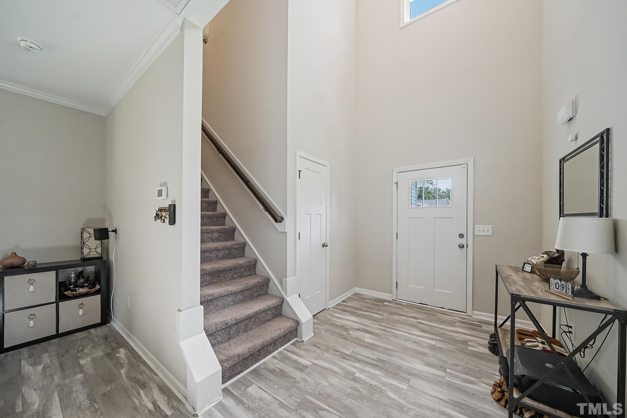 856 Juno Drive Broadway, NC 27505 - Photo 15 of 46 a view of a livingroom with furniture and staircase
