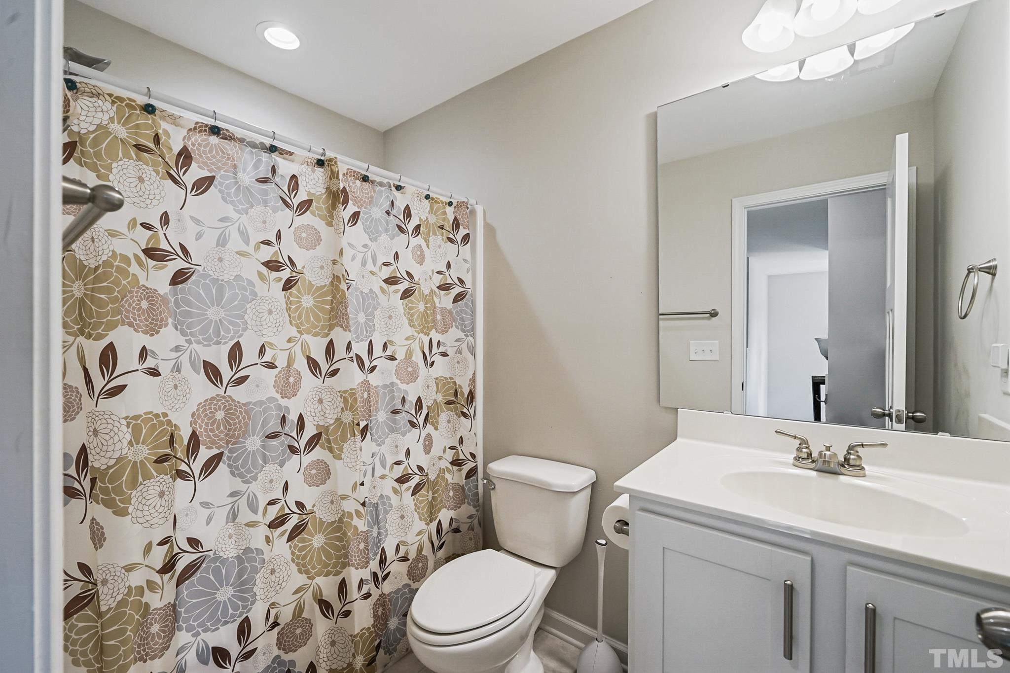 856 Juno Drive Broadway, NC 27505 - Photo 25 of 46 a bathroom with a sink toilet and shower