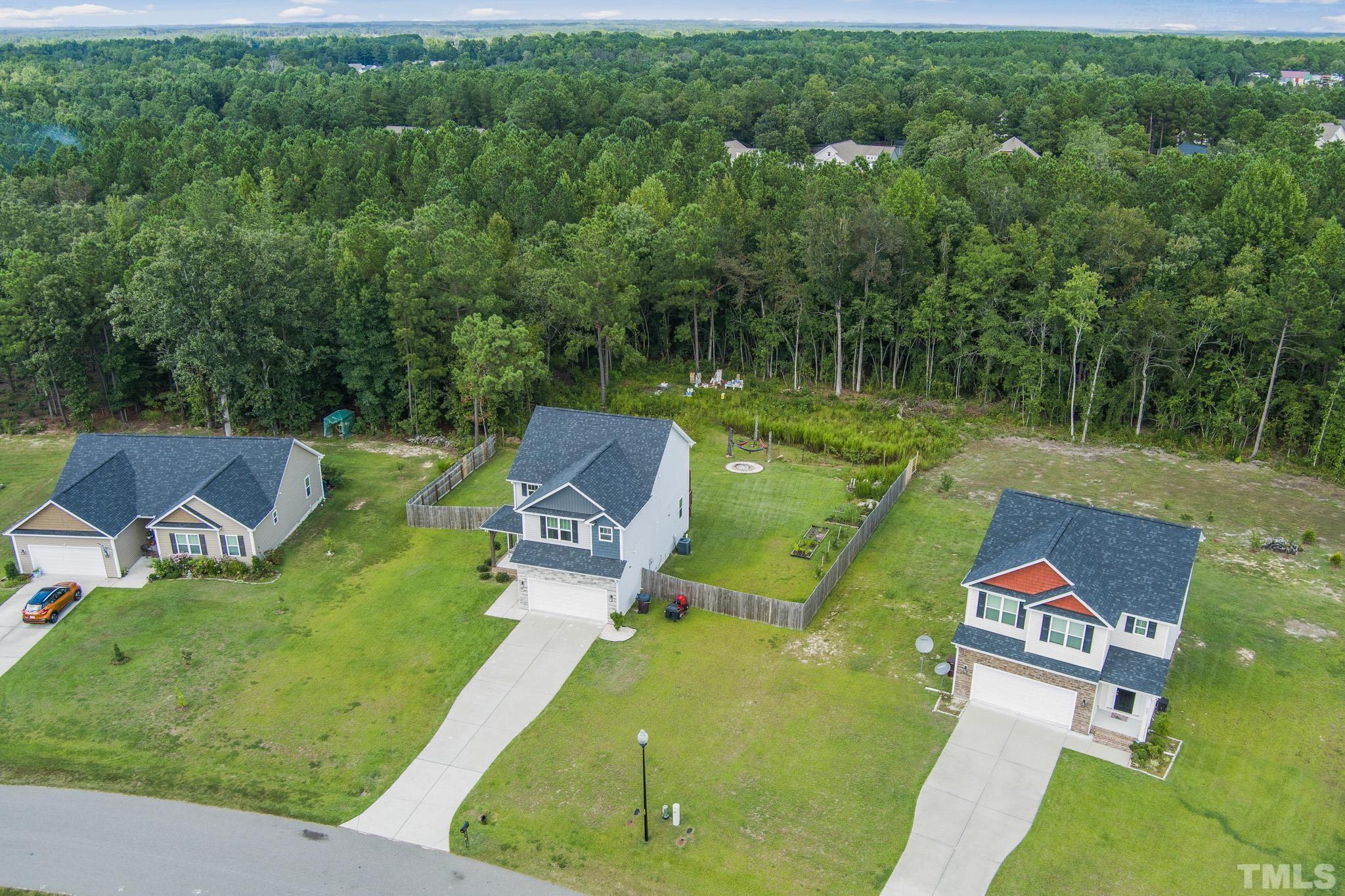 856 Juno Drive Broadway, NC 27505 - Photo 42 of 46 an aerial view of a house with a yard