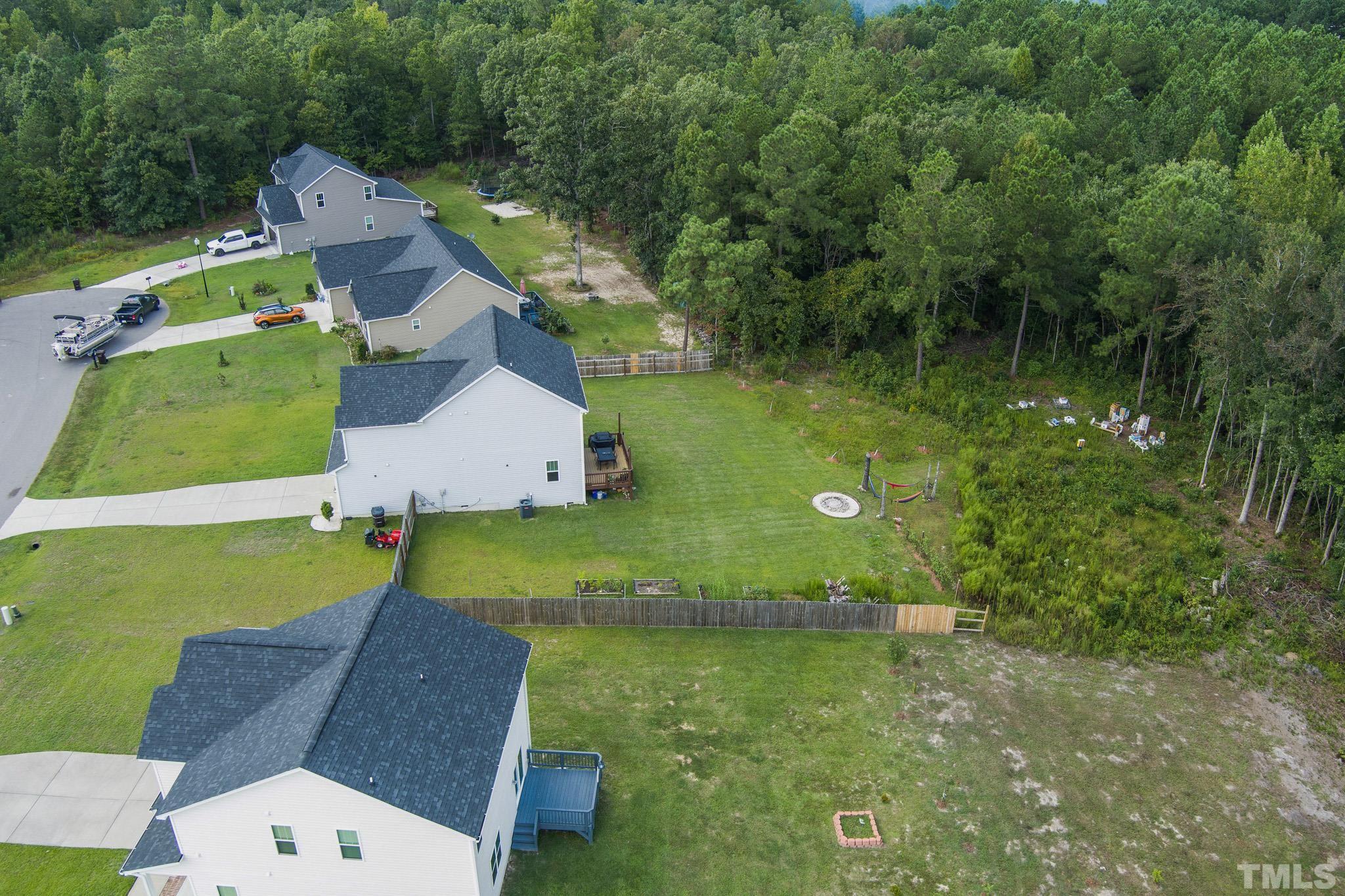 856 Juno Drive Broadway, NC 27505 - Photo 44 of 46 an aerial view of a house with a yard