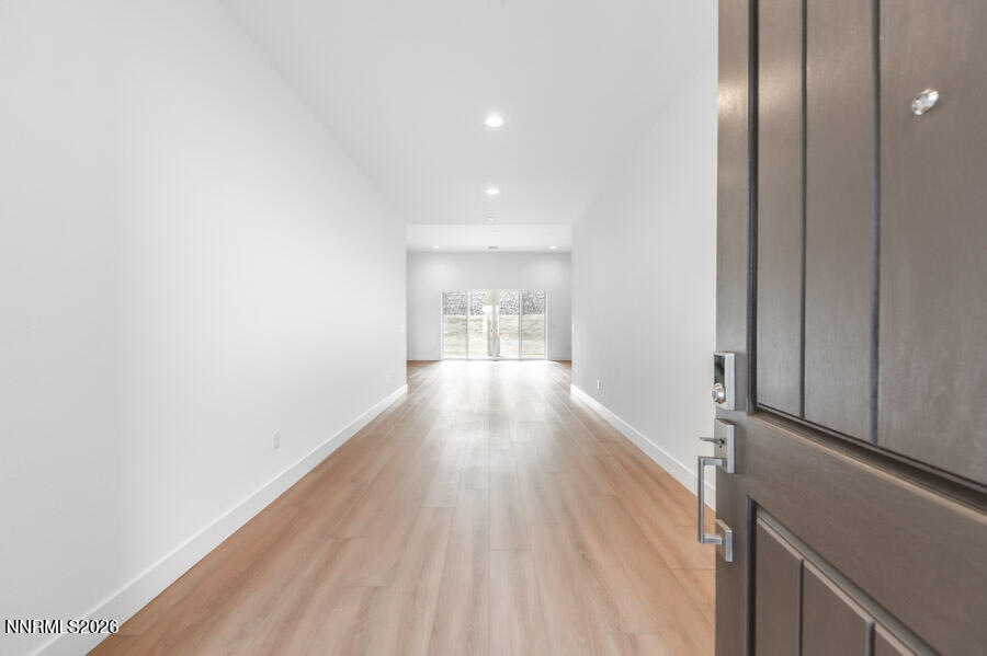 2400 Arrowroot Way, Unit CINNAMON 84 Sparks, NV 89441 - Photo 6 of 27 a view of hallway with wooden floor