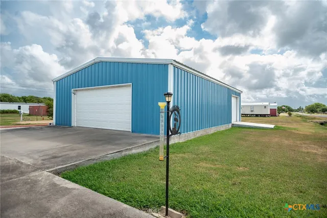a house view with a backyard space