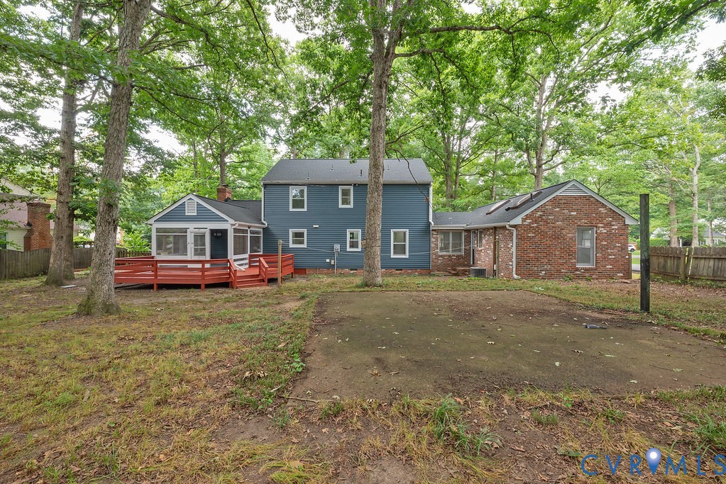 11840 Winfore Drive Midlothian, VA 23113 - Photo 37 of 40 Rear exterior featuring a red-painted wood deck, a