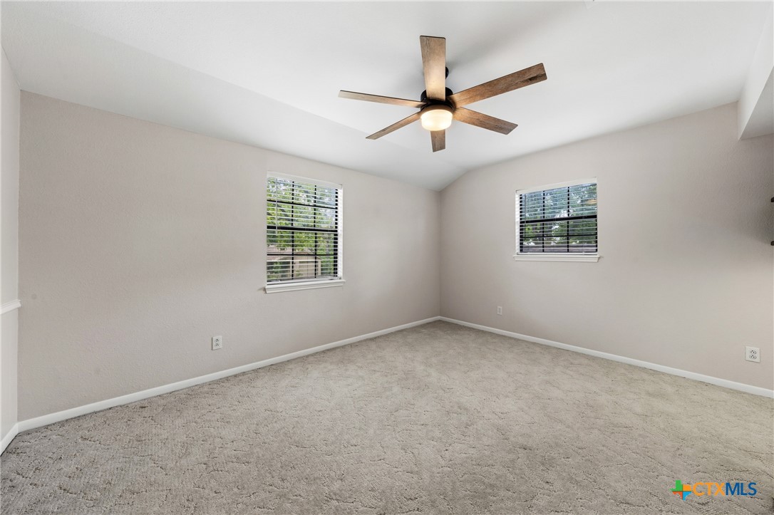 1903 North Harding Avenue Cameron, TX 76520 - Photo 35 of 44 an empty room with windows and fan