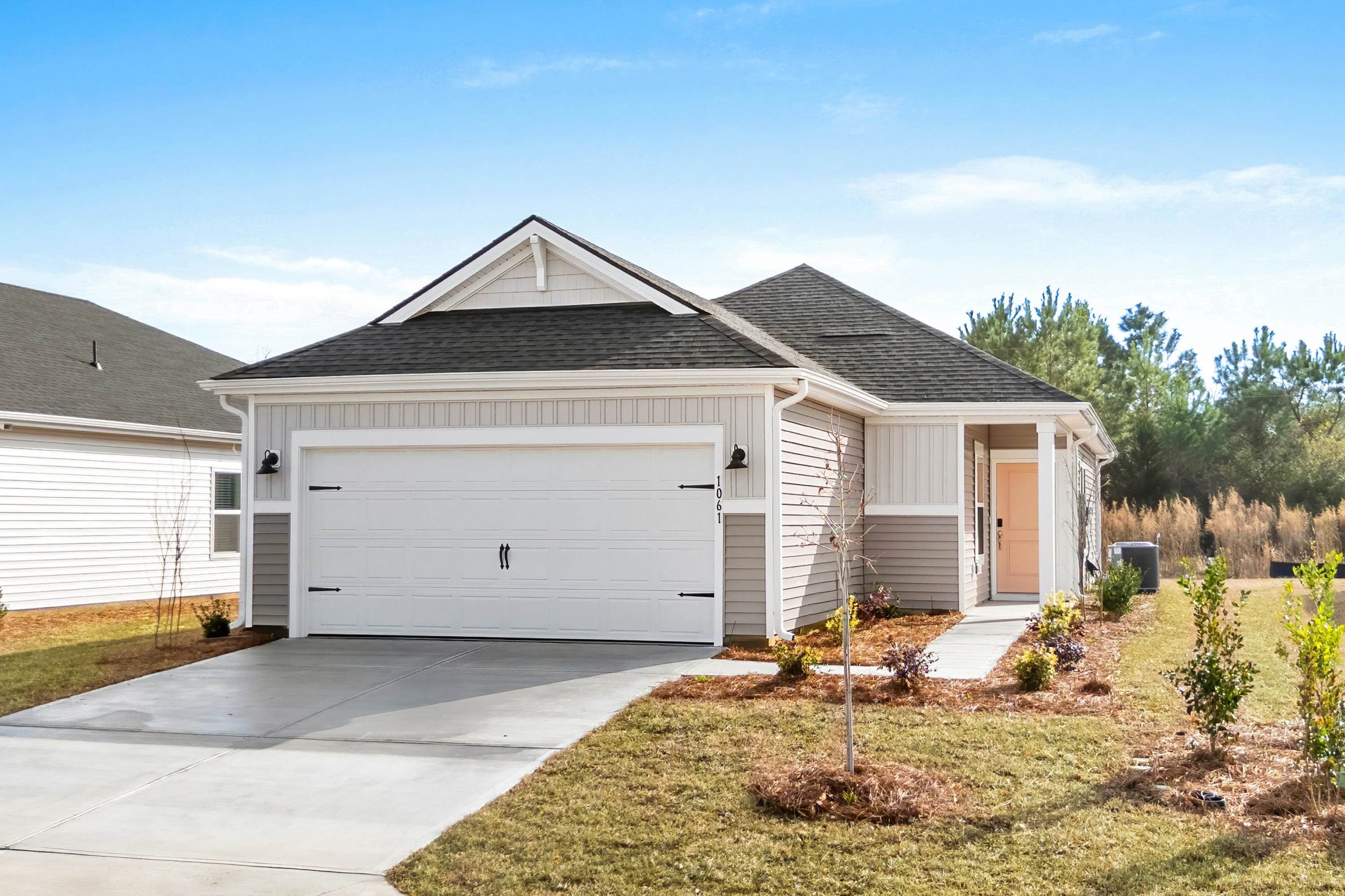 Photo is not of the actual home, but is an example photo of a completed home and may depict options and/or features that are not included