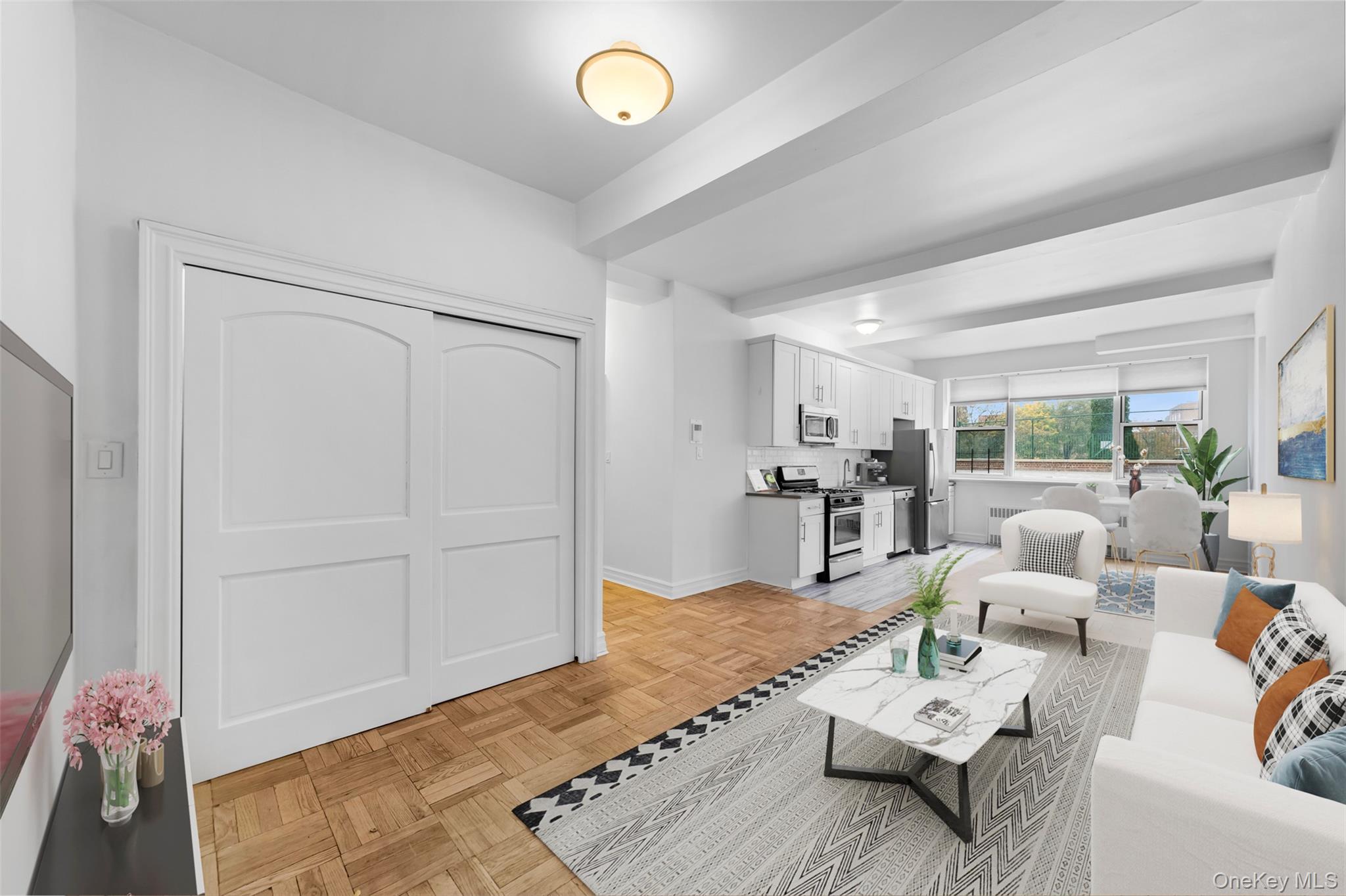 a living room with furniture and a table