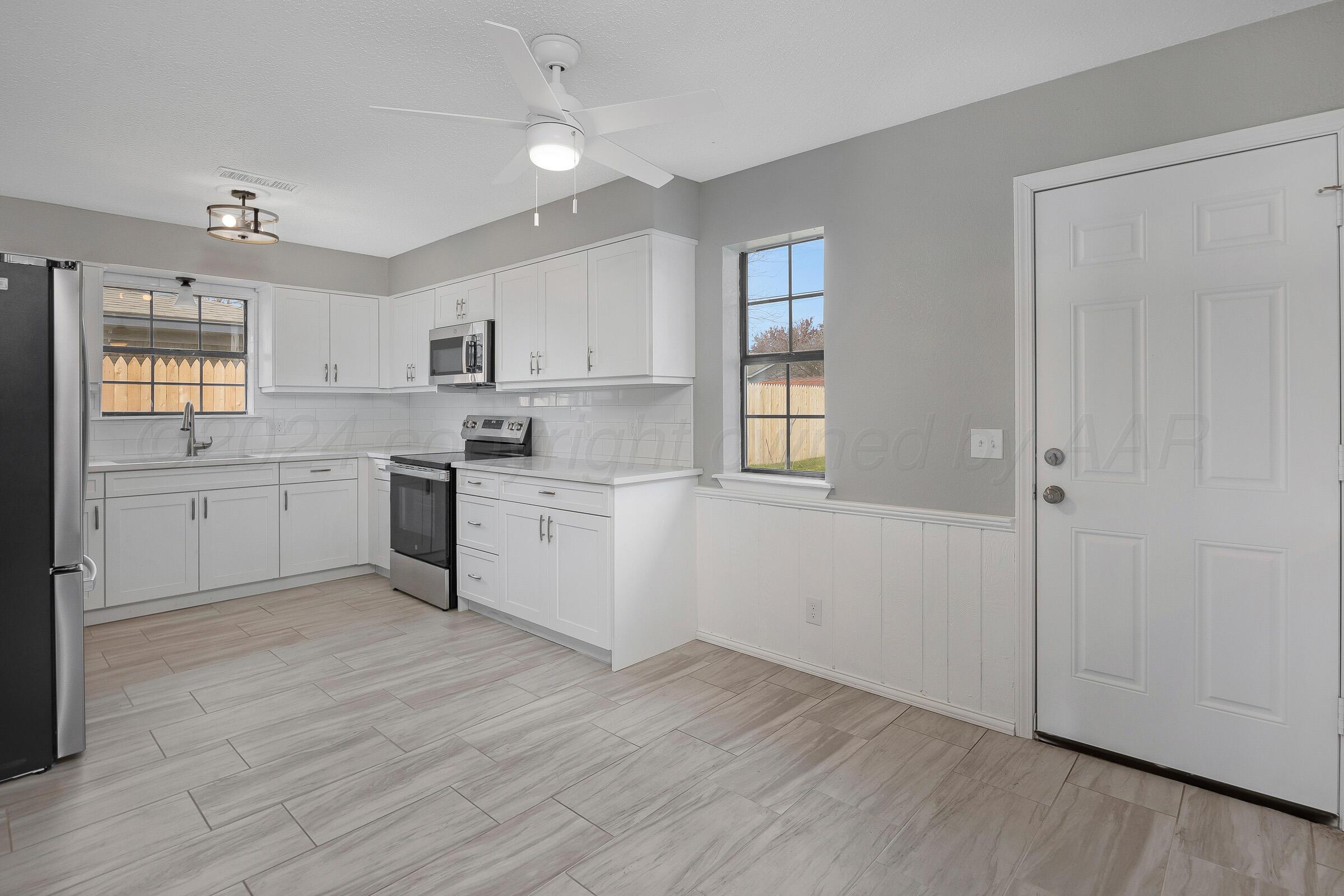 5302 Hillside Road Amarillo, TX 79109 - Photo 8 of 24 008_Dining And Kitchen