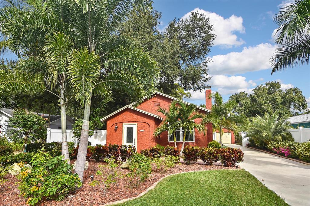 218 Pameto Road Nokomis, FL 34275 - Photo 1 of 1 Front of house - note detached garage on side