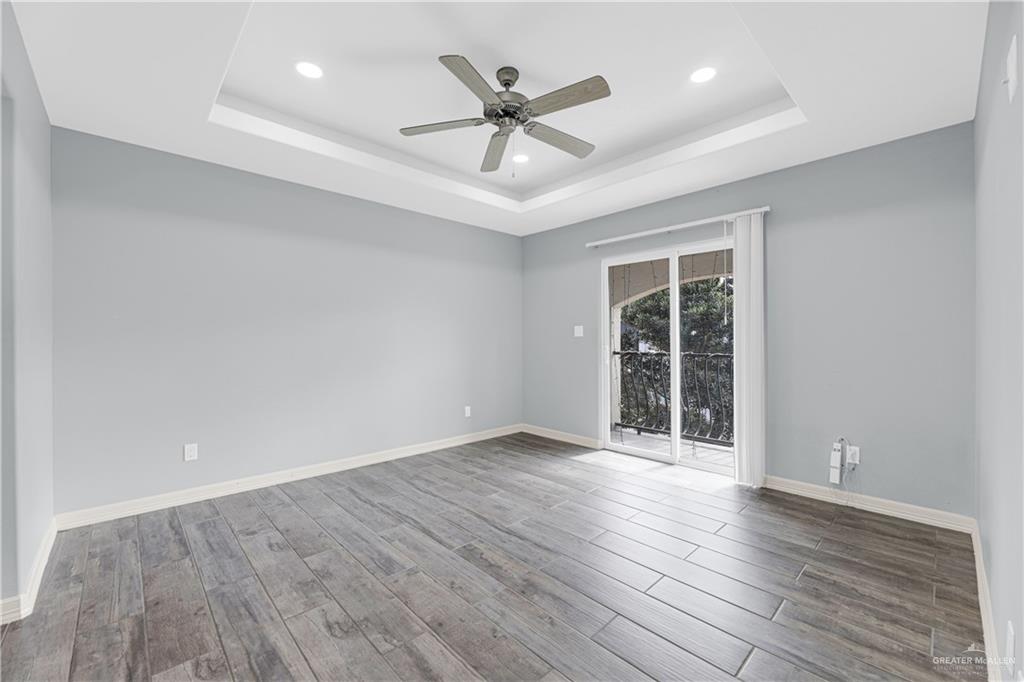 5305 North Crown Point Pharr, TX 78577 - Photo 15 of 24 wooden floor in an empty room with a window