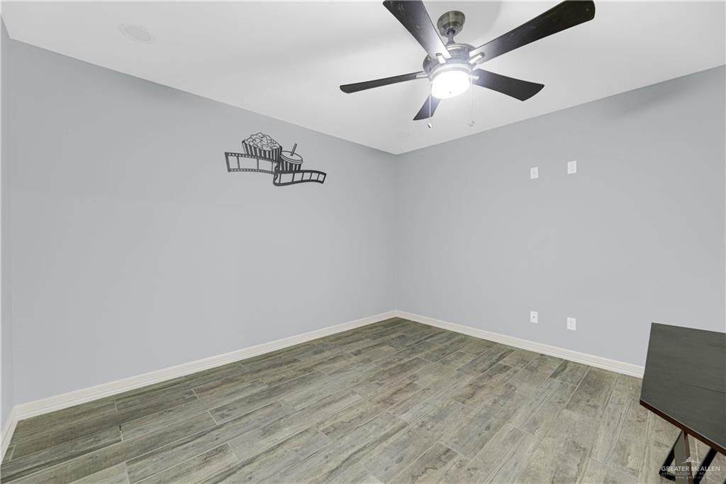 5305 North Crown Point Pharr, TX 78577 - Photo 19 of 24 wooden floor in an empty room