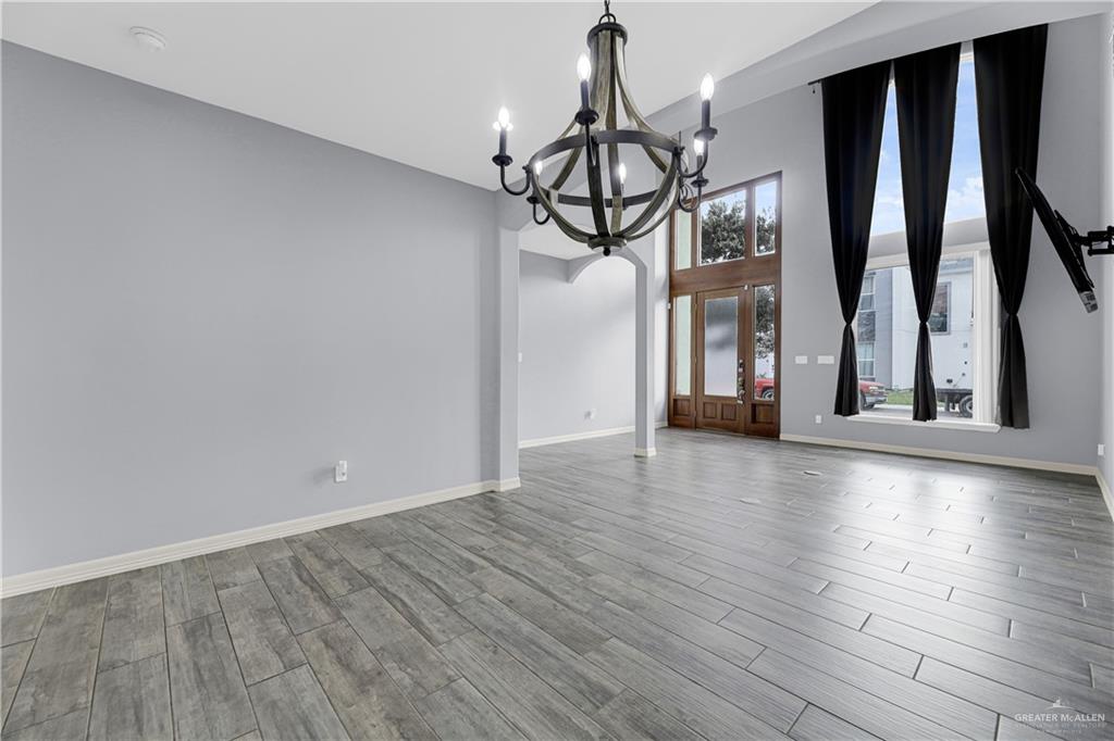 5305 North Crown Point Pharr, TX 78577 - Photo 7 of 24 a view of entryway with wooden floor