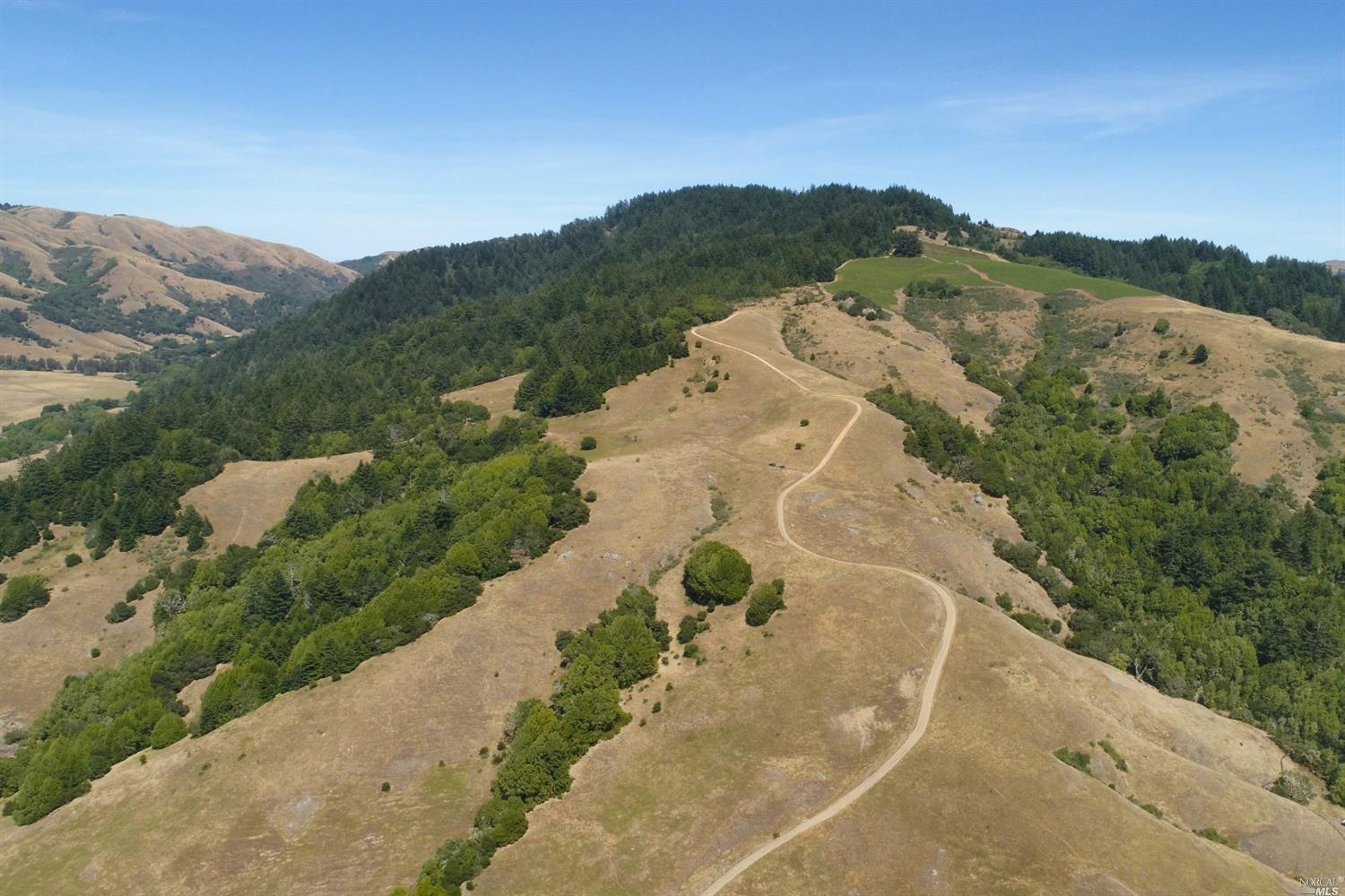 200 Old Rancheria Road Nicasio, CA 94946 - Photo 1 of 1 Spectacular venue to take in fresh air and nature. Shown road meanders on and off property from Old Rancheria Rd to top of Shroyer Mountain.