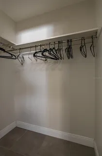 a view of a room with racks on the wall