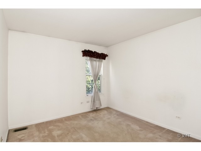 1028 Horizon Ridge Lake In The Hills, IL 60156 - Photo 8 of 10 a view of empty room