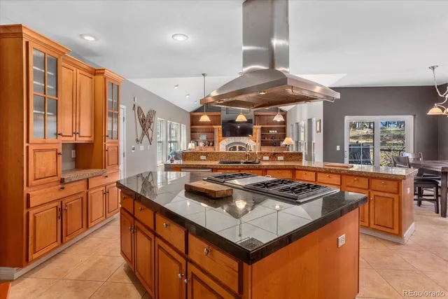 a living room with furniture rug and window