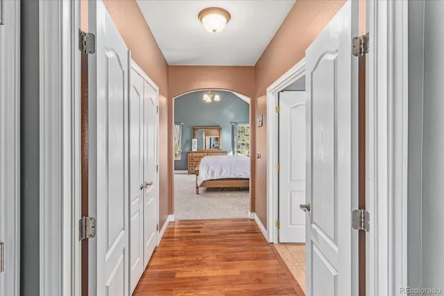 a bathroom with a tub and window