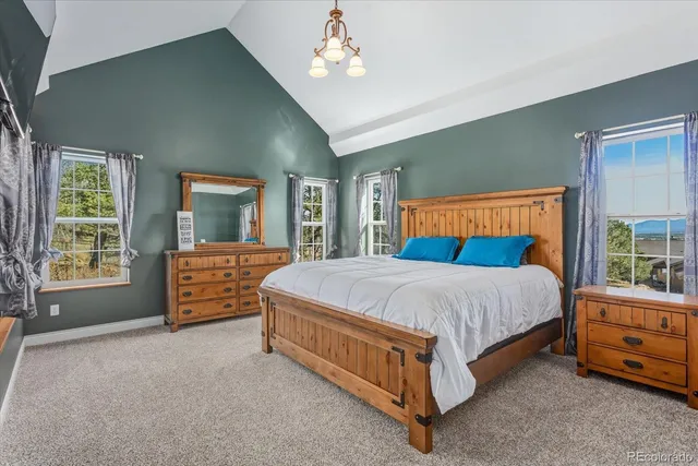 an empty room with a bathroom and a sink