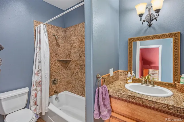 a view of a room with wooden walls