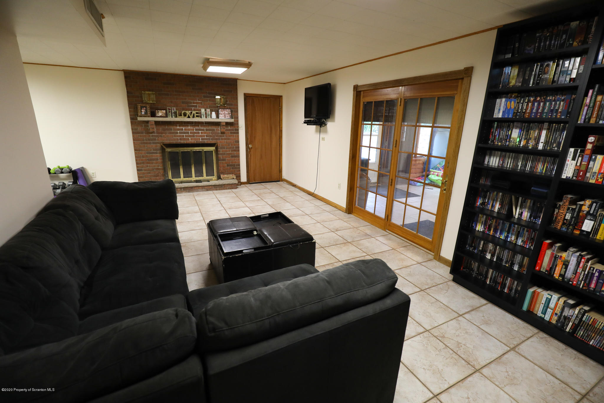 3 Patrick Road Pittston, PA 18640 - Photo 13 of 16 a living room with furniture hardwood and a fireplace