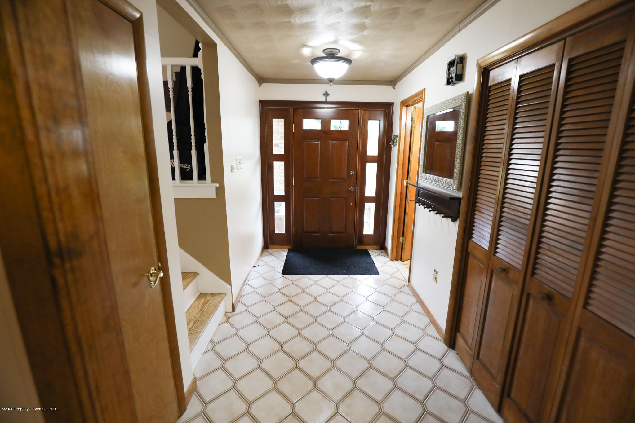3 Patrick Road Pittston, PA 18640 - Photo 2 of 16 a view of entryway with a front door and wooden floor