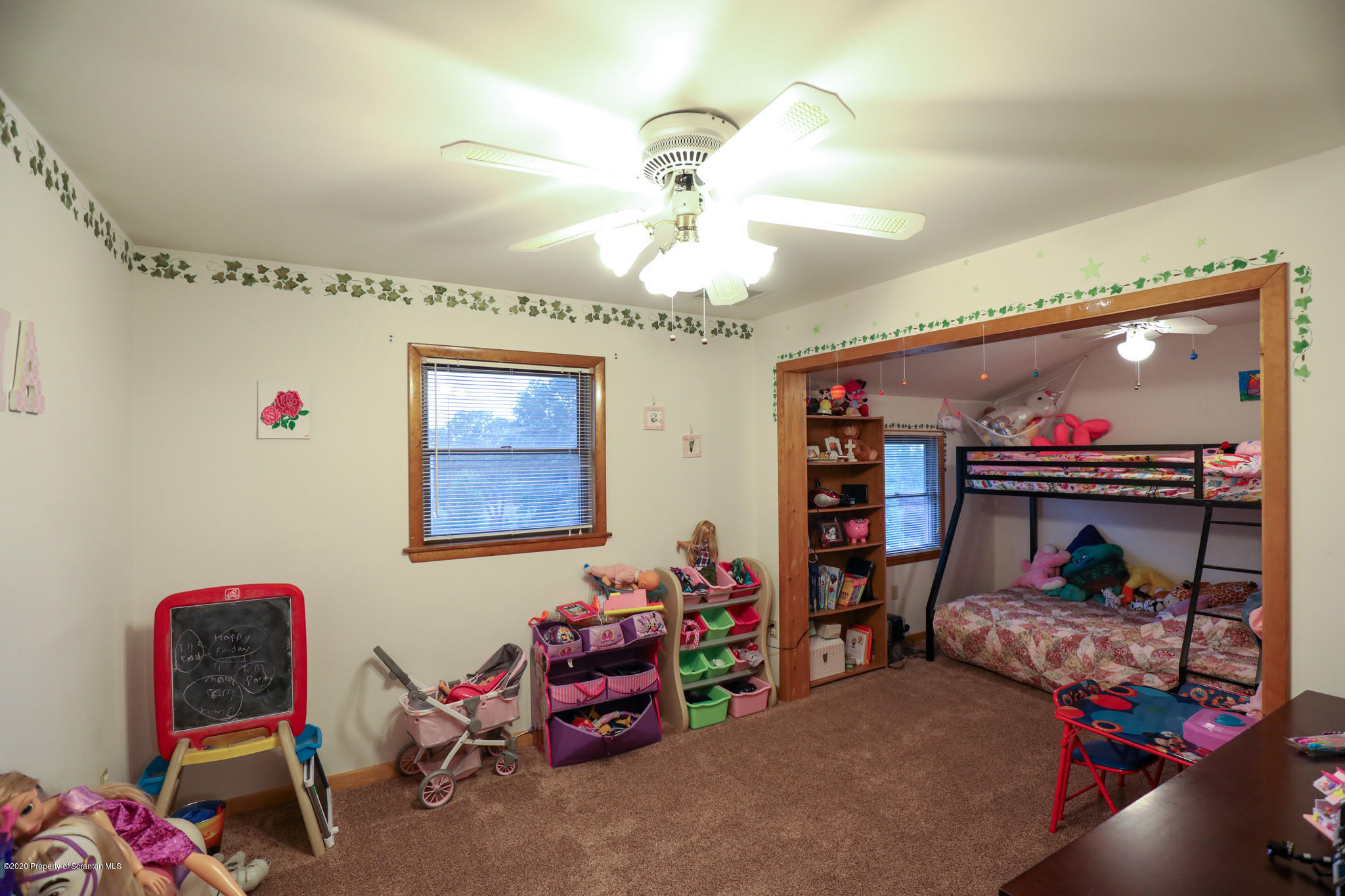 3 Patrick Road Pittston, PA 18640 - Photo 6 of 16 a room with toys and a chandelier