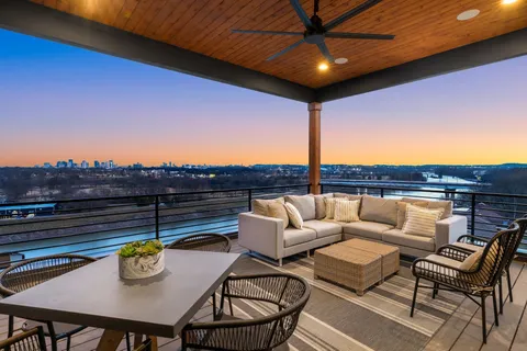 a view of a terrace with furniture