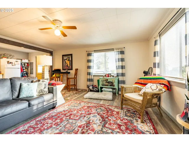 a living room with furniture and a table