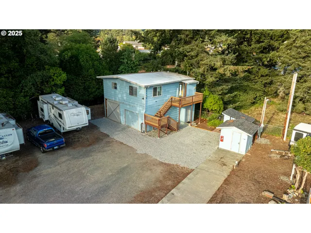 a upper view of a house with a yard