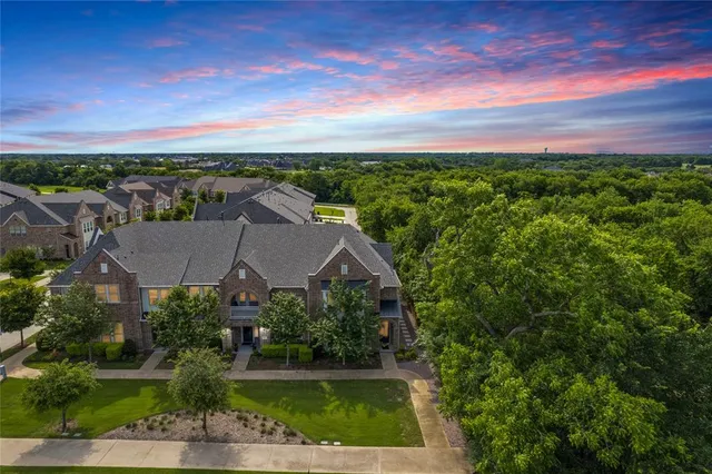 an aerial view of house with yard swimming pool and outdoor seating