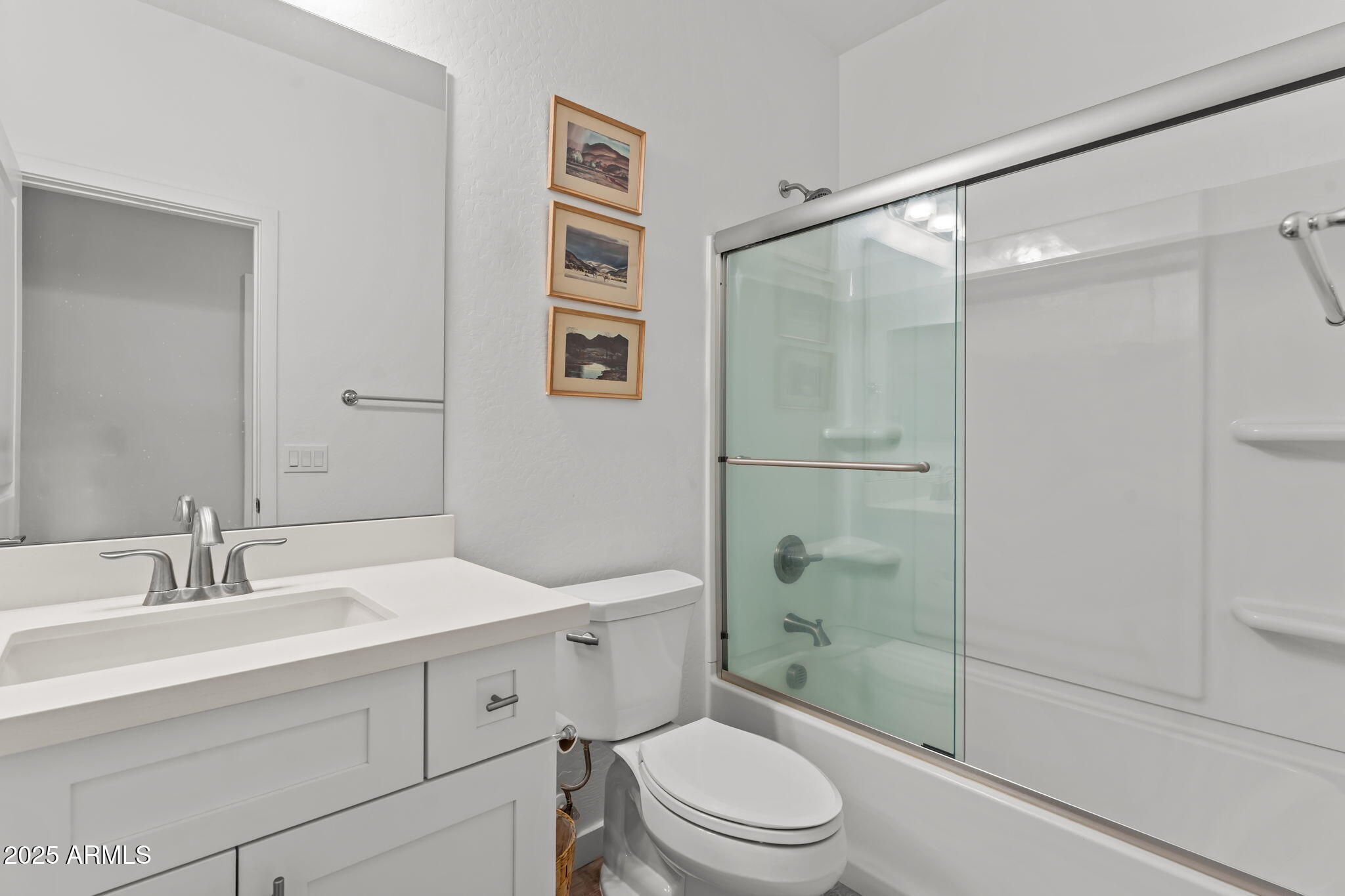 1995 West Ringo Road Wickenburg, AZ 85390 - Photo 15 of 22 a bathroom with a sink a toilet and shower
