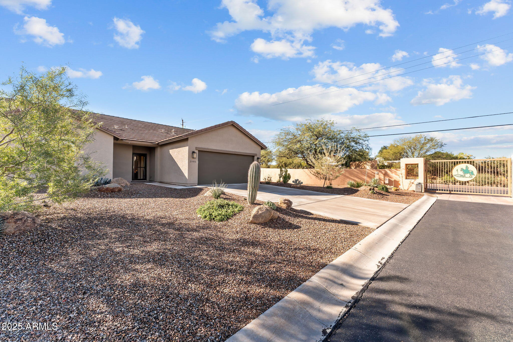 1995 West Ringo Road Wickenburg, AZ 85390 - Photo 21 of 22 a view of a house with a yard