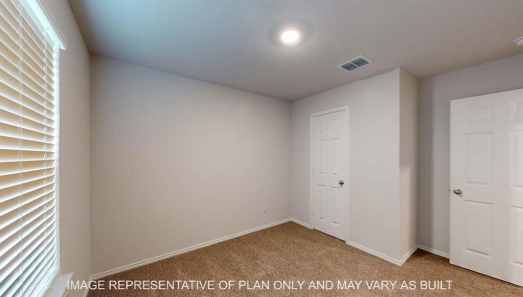 10428 Neptune Court Waco, TX 76708 - Photo 9 of 12 Carpeted flooring, white interior doors, window with blinds, recessed ceiling lighting, and neutral wall tones