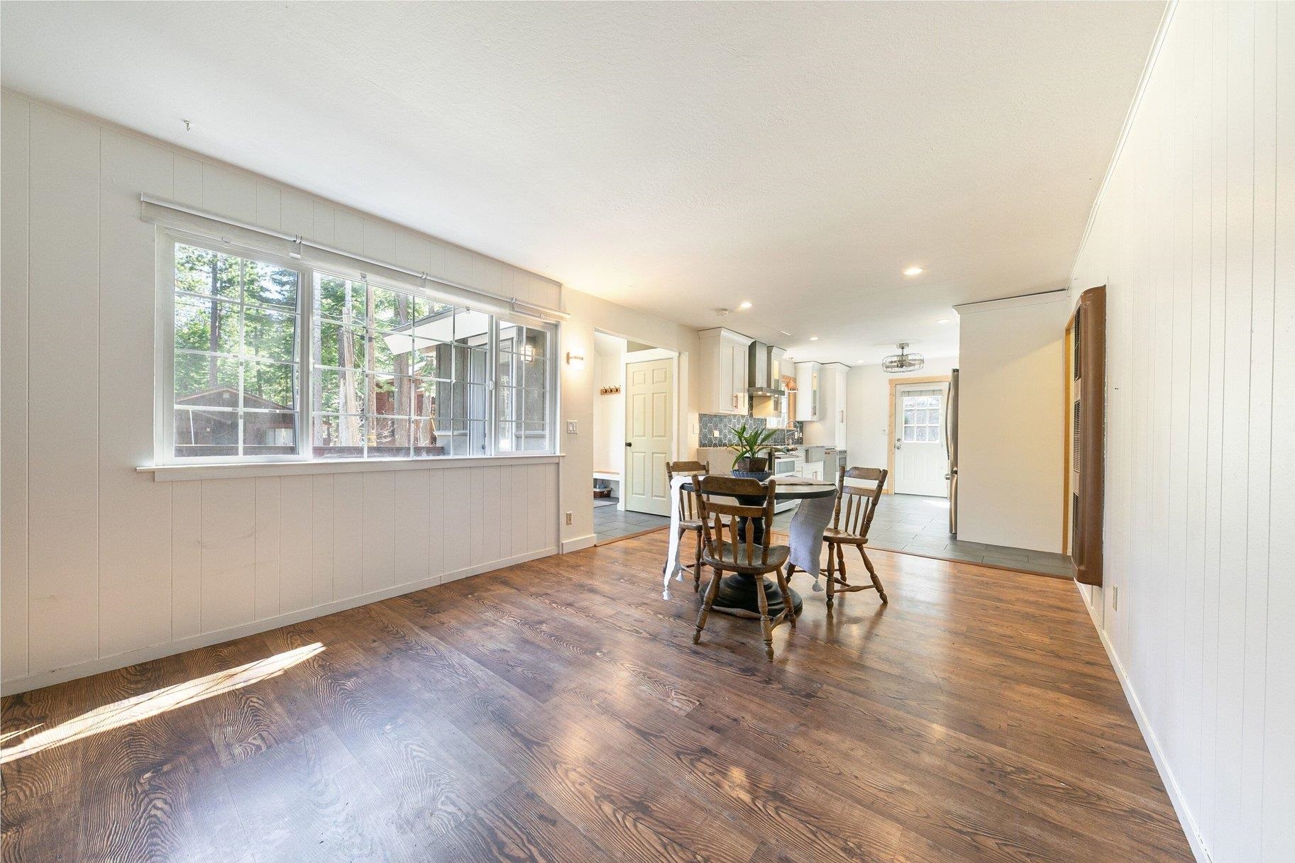 7294 3rd Avenue Tahoma, CA 96142 - Photo 11 of 23 a view of a dining room with furniture and a window