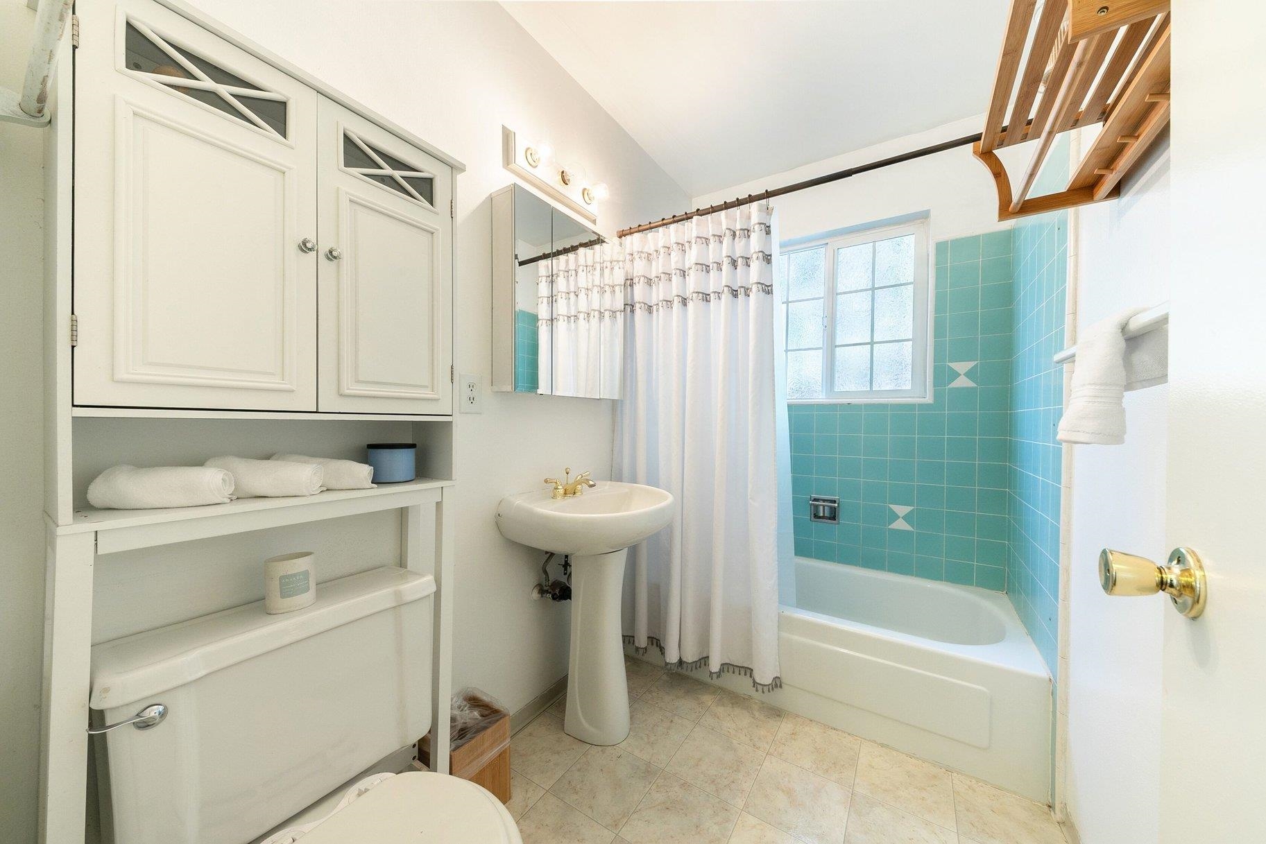 7294 3rd Avenue Tahoma, CA 96142 - Photo 16 of 23 a bathroom with a sink a toilet and shower
