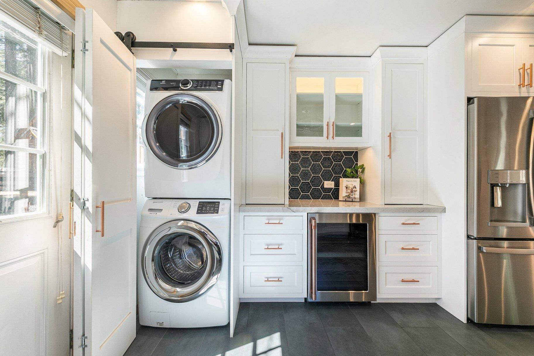 7294 3rd Avenue Tahoma, CA 96142 - Photo 5 of 23 a view of a hallway with washer and dryer