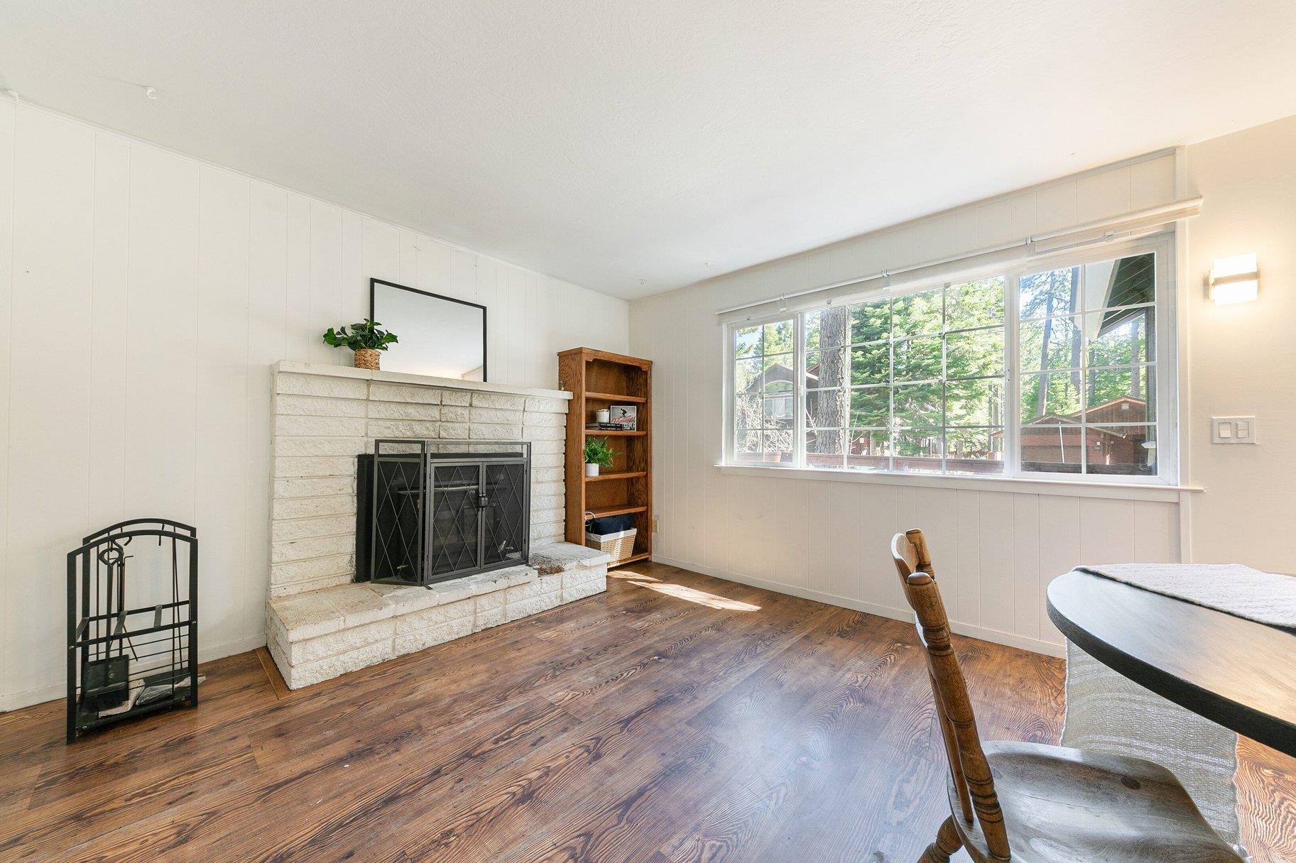 7294 3rd Avenue Tahoma, CA 96142 - Photo 8 of 23 a view of a livingroom with furniture and a fireplace