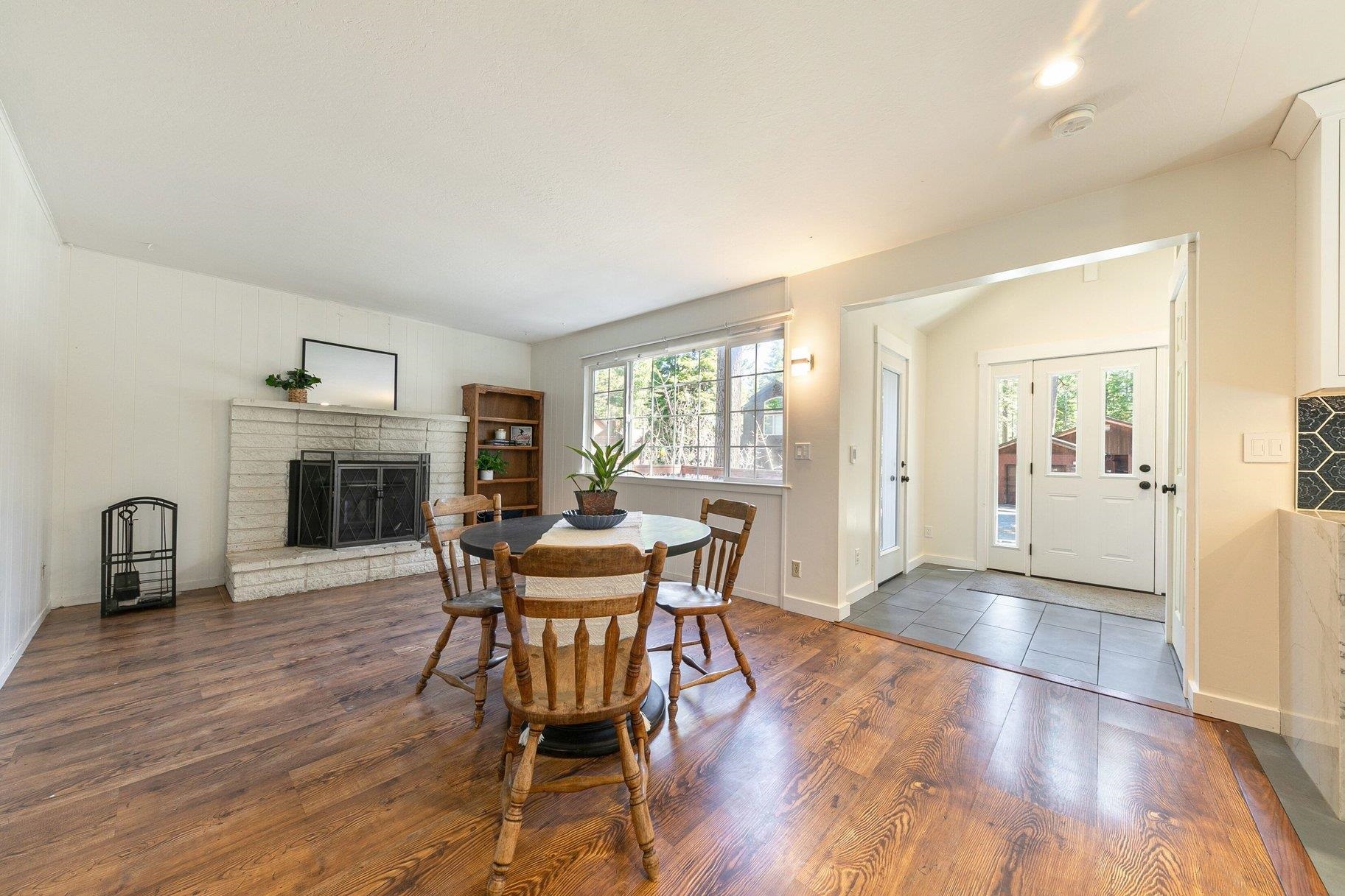 7294 3rd Avenue Tahoma, CA 96142 - Photo 9 of 23 a dining room with furniture window and wooden floor