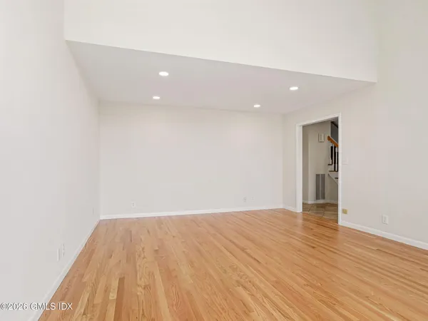 a bathroom with a double vanity sink toilet and shower