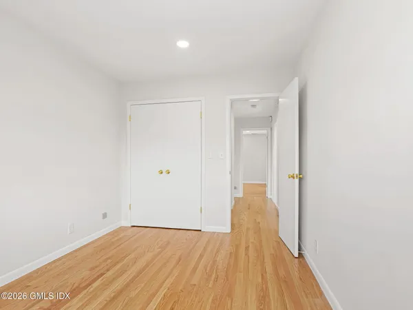 a view of a house with backyard and garden