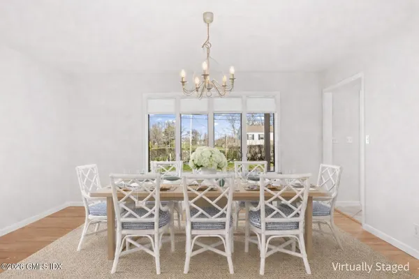 a living room with fireplace and a fireplace
