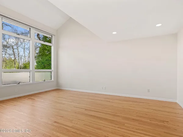 a kitchen with stainless steel appliances a stove a sink and a refrigerator