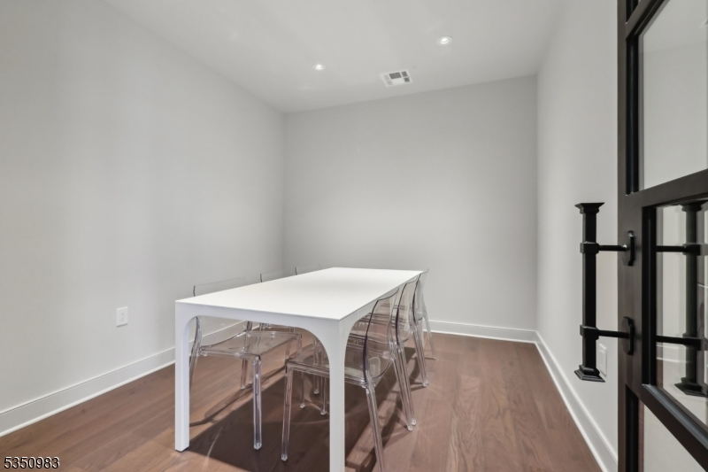 434 Springfield Avenue, Unit 119 Berkeley Heights, NJ 07922 - Photo 19 of 29 a view of a room with wooden floor