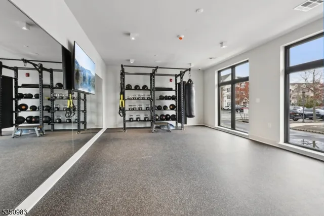 a view of an empty room with windows