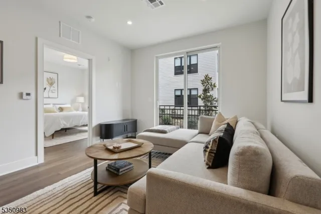 a living room with furniture and a table