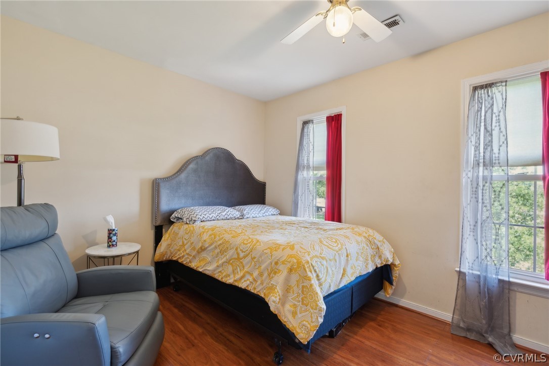 7700 Drexelbrook Road Chesterfield, VA 23832 - Photo 17 of 24 a bedroom with a bed couch and window